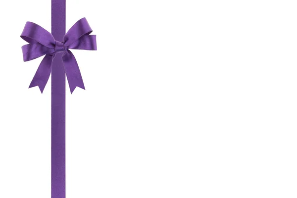 Purple ribbon with a bow on white background — Stock Photo, Image