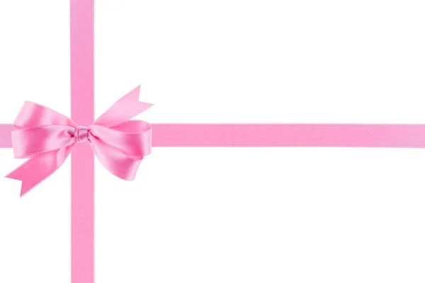 Pink ribbon with a bow on white background — Stock Photo, Image