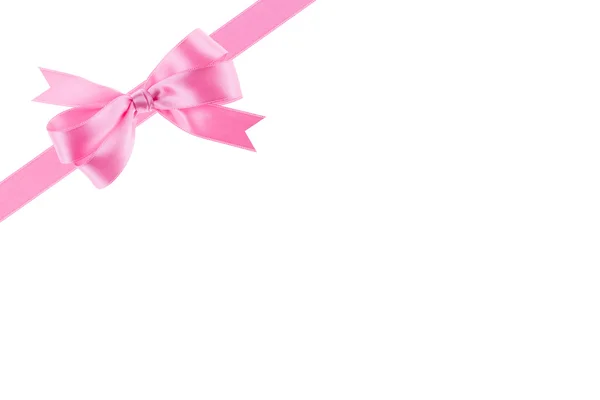 Pink ribbon with a bow on white background — Stock Photo, Image