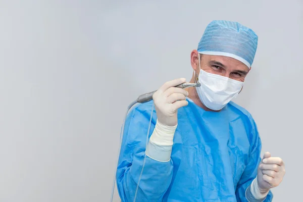 Dentists during surgery for implant placement Royalty Free Stock Photos