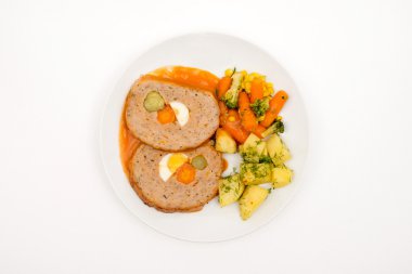 Roll of meat and vegetables.