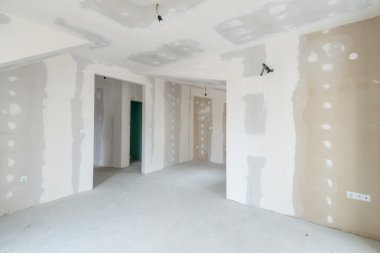 Unfinished building interior, white room clipart