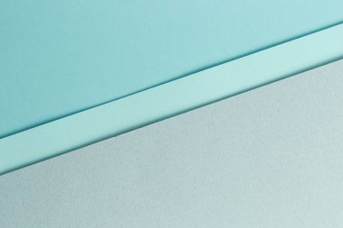 Malzeme tasarımı mavi arkaplan. Kağıt kağıtlar farklı şekillerde katlanır. Bir fotoğraf.