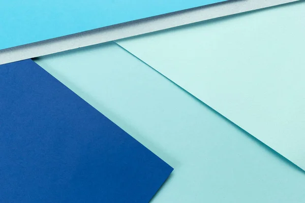 Material Design Blue Background Craft Paper Sheets Folded Different Ways Royalty Free Stock Photos