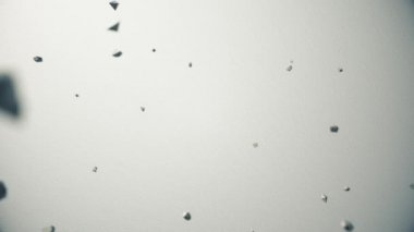 Düz beyaz bir yüzeye düşen binlerce taş parçası. Soyut arkaplan. Üst Görünüm