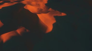 Flight in the endless hot desert over the dunes and sandy mountains. Timelapse. 3d animation