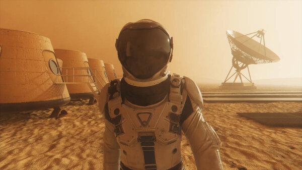 Астронавт на планете Марс делает крюк вокруг своей базы. Астронавт идет по базе. Небольшая пыльная буря. Спутниковая тарелка отправляет данные на землю. 3D иллюстрация