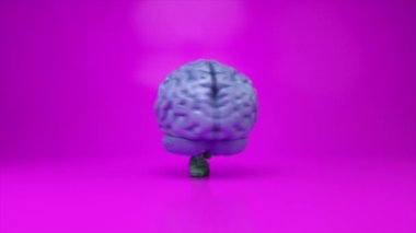 Renkli pembe bir arka planda dans eden beyin. Yapay zeka konsepti. Kusursuz bir döngünün 3d animasyonu