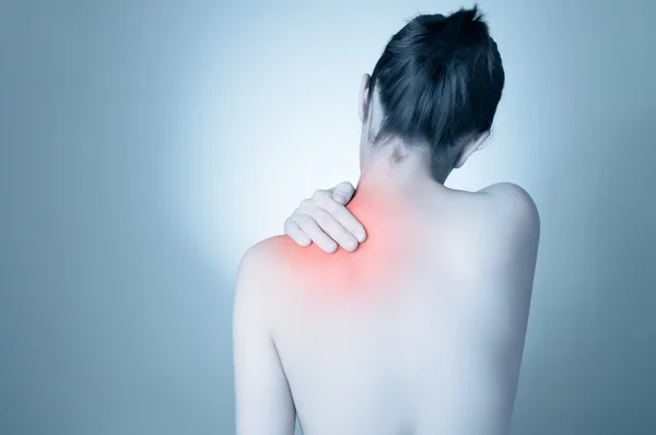 Donna con mal di schiena — Foto Stock