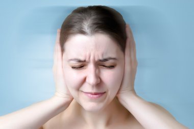 Woman suffering from noise clipart