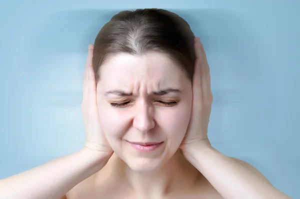 Woman suffering from noise — Stock Photo, Image