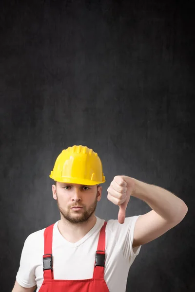 Unhappy construction worker — Stock Photo, Image