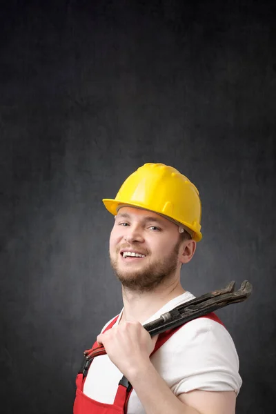 Portrait of a happy, smiling plumber — Stock Photo, Image