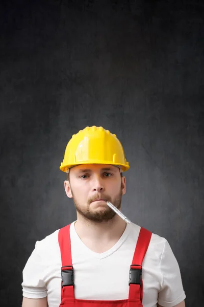 Portrait of a sick construction worker — Stock Photo, Image