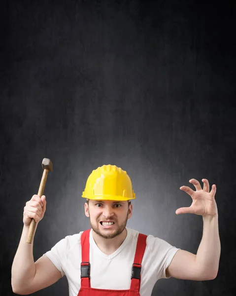 Angry Construction Worker Hammer His Hand — Stock Photo, Image