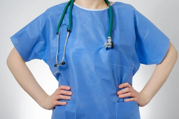 Confident doctor in blue uniform — Stok fotoğraf