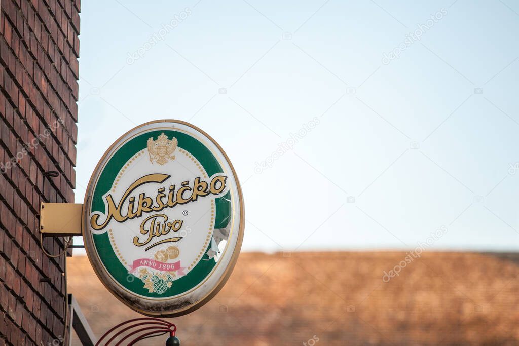 BELGRADE, SERBIA - MARCH 28, 2019: Logo of Niksicko pivo on a bar retailer, one of Montenegrian Light Beers. it belongs to Molson Coors and is produced by Trebejsa brewery