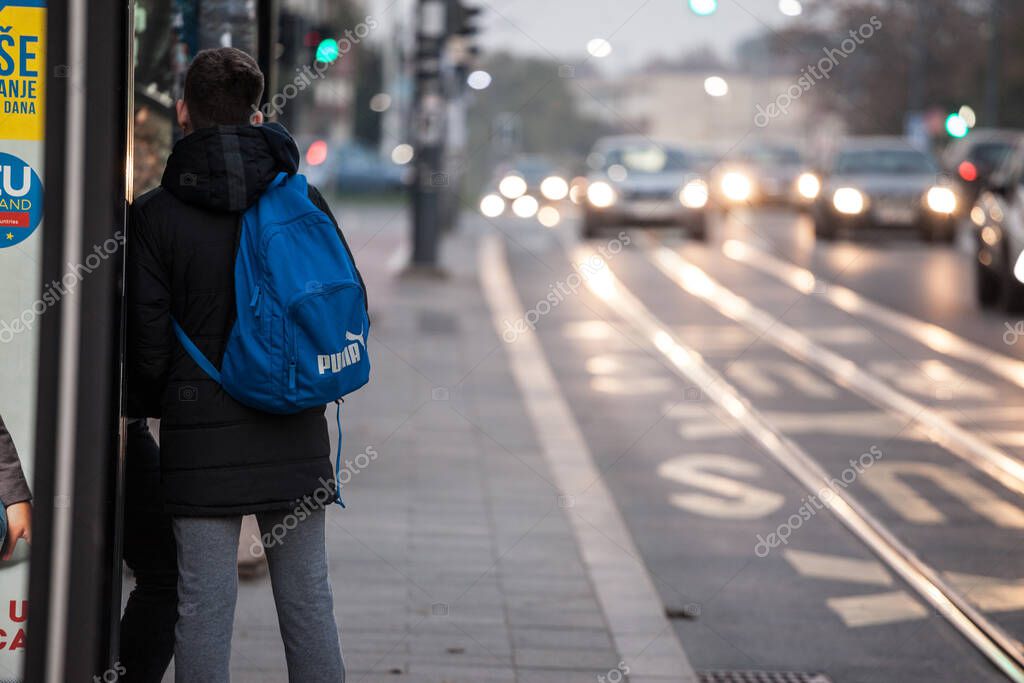 BELGRADE, SERBIA - NOVEMBER 8, 2020: Logo of Puma on a backpack worn by a man in the streets of Belgrade. Puma is a German sportswear brand, the biggest in Europe specialized in clothing and apparel