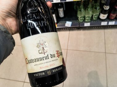 BELGRADE, SERBIA - FEBRUARY 26, 2021: Bottle of Chateauneuf du Pape wine from Victor Berard, a local producer. Chateauneuf du pape is a french red wine appelation from Rhone region