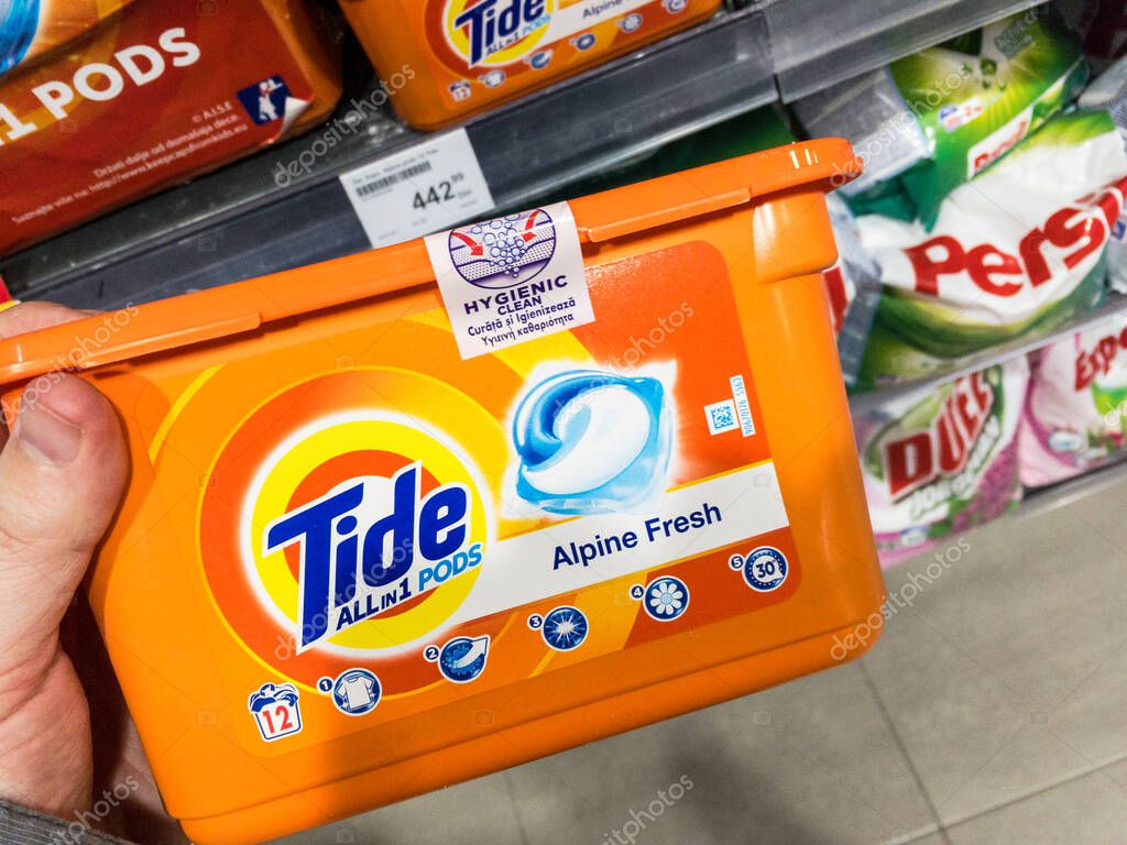 BELGRADE, SERBIA - MARCH 4, 2021: Logo of Tide detergent on pods  for sale. Part of Procter and Gamble, Tide Pods is an american brand of laundry detergent and household cleaning