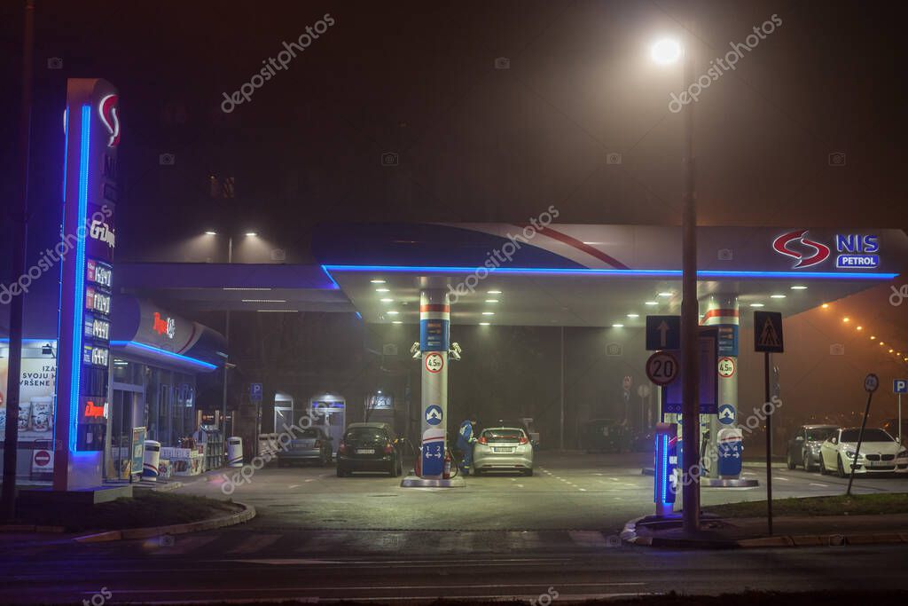 BELGRADE, SERBIA - JANUARY 13, 2020: Selective blur on NIS Naftna industrija Srbije logo on one of its gas stations of Belgrade. NIS is a Serbian petroleum and gas company owned by russian Gazprom Naftagas