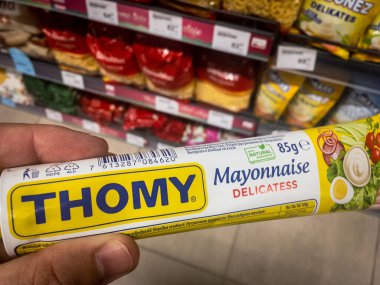 BELGRADE, SERBIA - JULY 28, 2021: Thomy logo on a tube of Mayonnaise for sale in Belgrade. Part of Nestle, Thomy is a Swiss food producer specialized in condiments and sauces.