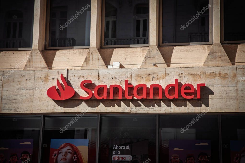 VALENCIA, SPAIN - APRIL 6, 2025: Logo of Santander Bank on their local office in Valencia. Banco Santander is a spanish retail and corporate bank with branches in Europe.