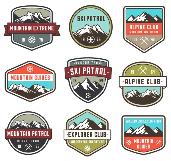 Color de montaña Vector insignias — Vector de stock