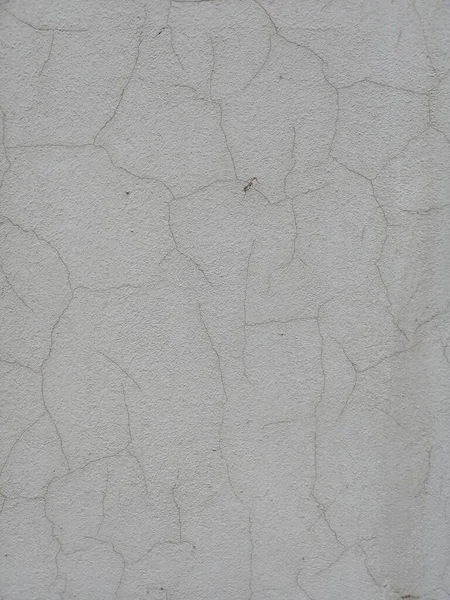 Tekstura Starej Białej Teksturowanej Ściany Pęknięciami — Zdjęcie stockowe