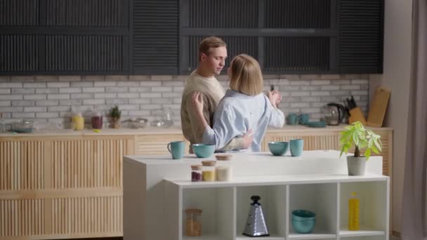 Happy Cheerful Couple Dancing On Kitchen While Cooking Together. — Stock Video