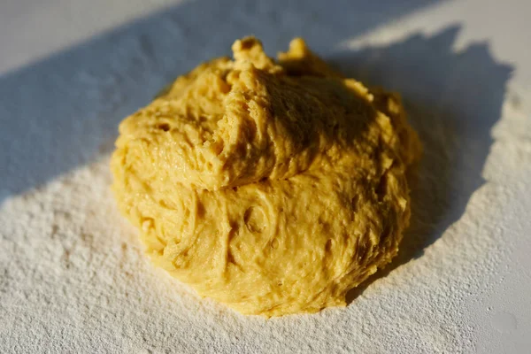 Fresh yeast dough on white table with sunset sunlight — Stock Photo, Image