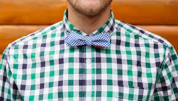 Casual bearded fashion gentleman with bowtie — Stock Photo, Image