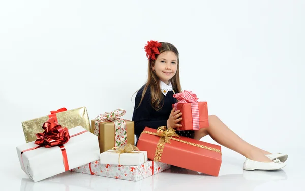 Girl with christmas gifts — Stock Photo, Image