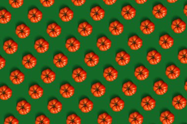 Yeşil arkaplanda domates deseni