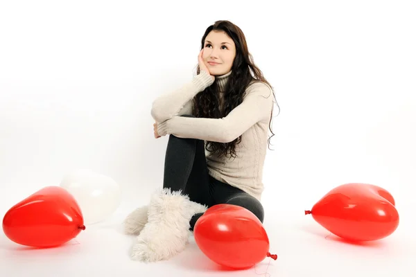 Flicka med röda ballonger — Stockfoto