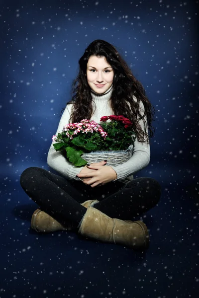 Beautiful girl with flowers — Stock Photo, Image