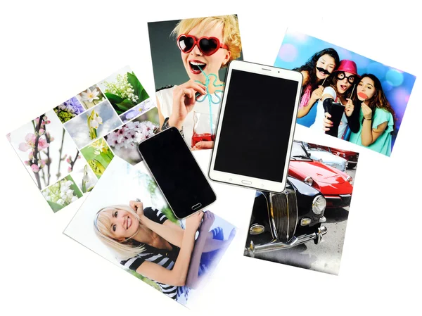 Tablet, telephone and printed photos — Stock Photo, Image