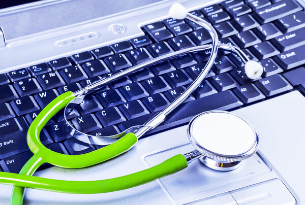  Stethoscope over a computer keyboard