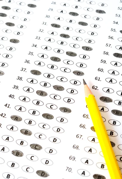 A pencil sitting on a test bubble sheet — Stock Photo, Image