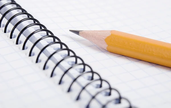 Blank notebook and pencil Stock Photo