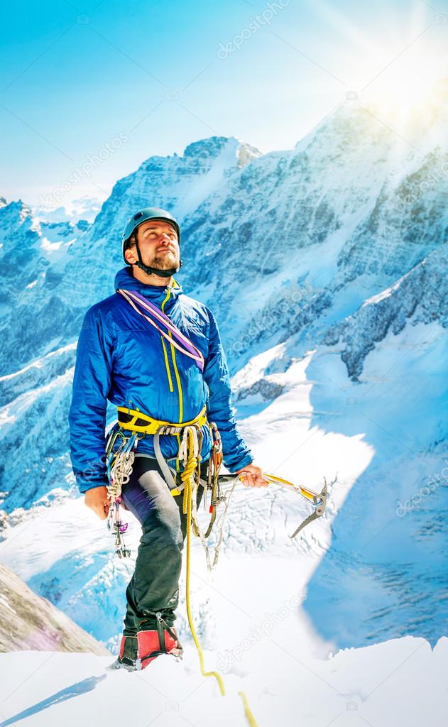 Climber reaching the summit