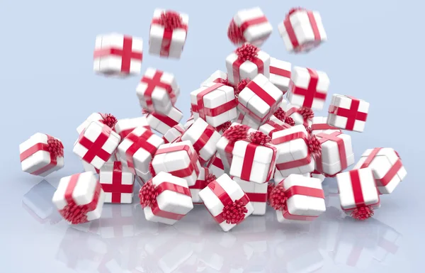 Fallende Weihnachtsgeschenkboxen Mit Roten Schleifen Und Bändern Auf Grauem Hintergrund lizenzfreie Stockfotos
