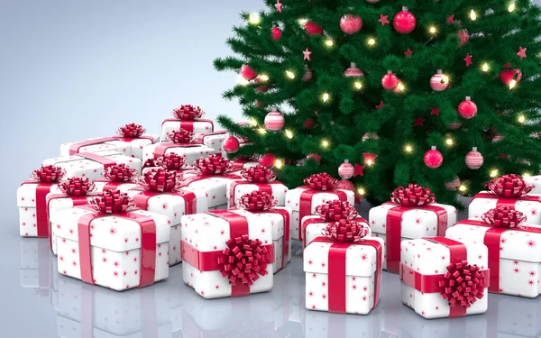 礼品盒和装饰过的圣诞树 上面镶嵌着闪闪发光的花环 球和星星 — 图库照片