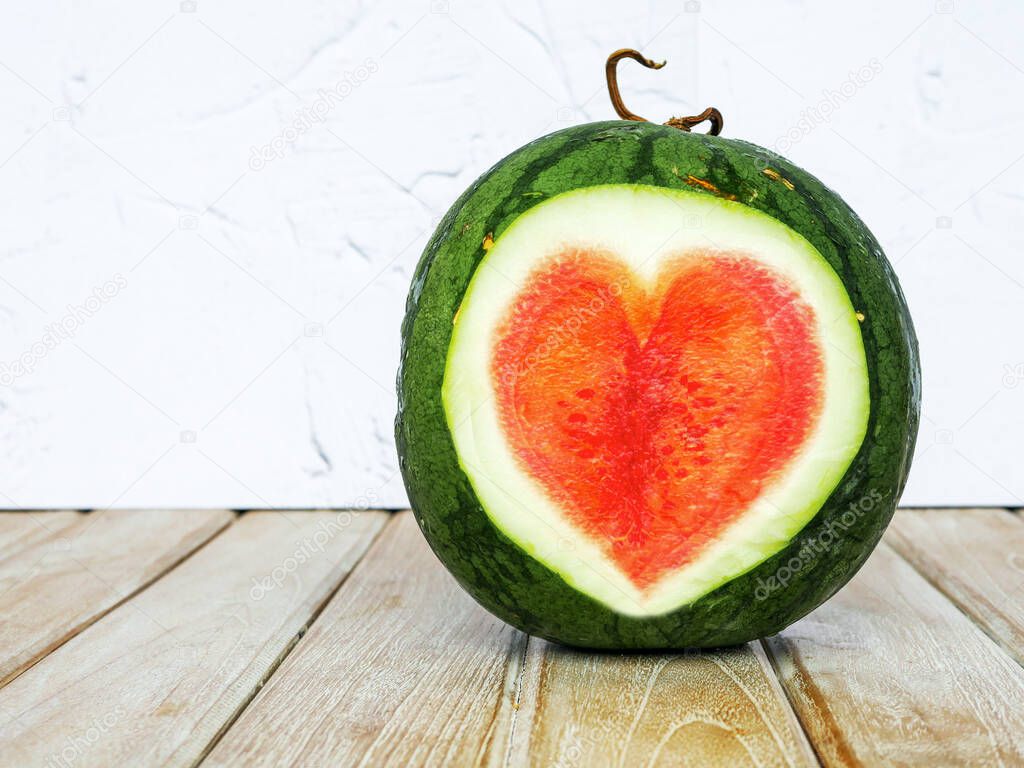 Heart shapered watermelon on a white background