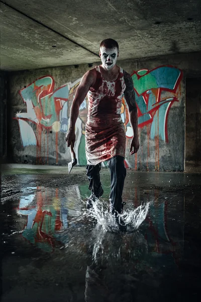 Bloody clown-maniac with ax — Stock Photo, Image