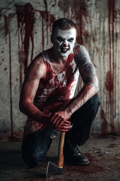 Bloedige clown-maniac met ax — Stockfoto
