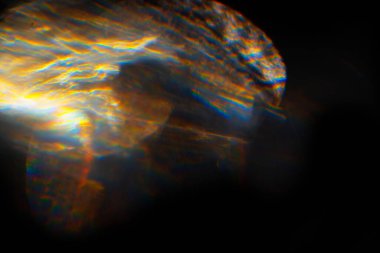 Soyut bulanık lensler siyah renkte parlıyor.