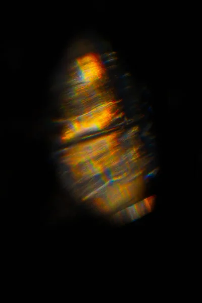 Abstraktní rozmazané barevné čočky světlice bokeh na černé — Stock fotografie