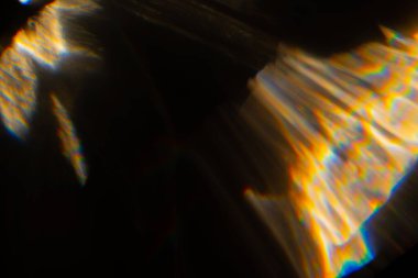 Soyut bulanık lensler siyah renkte parlıyor.