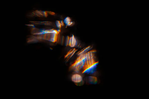Résumé flare flare de lentilles colorées floues bokeh sur noir — Photo